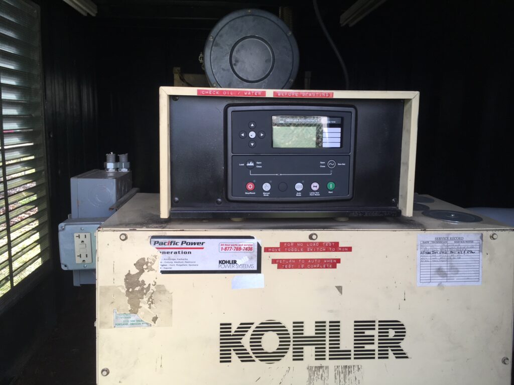 A DSE control panel on a Kohler standby generator after local power generation accessories installation.