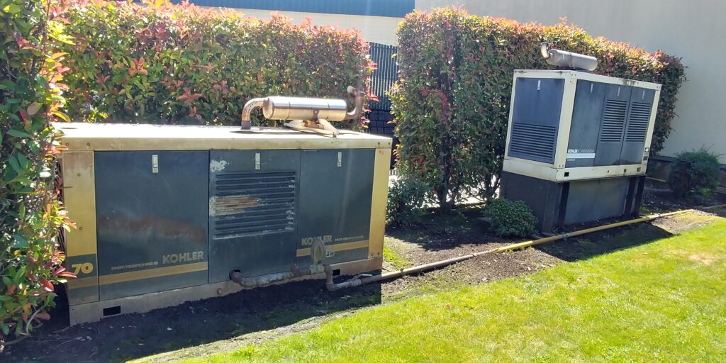 Two Kohler gensets ready to be replaced by new generator installations