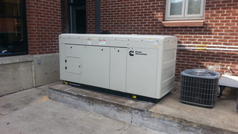 A Cummins Standby Generator on the side of a commercial building