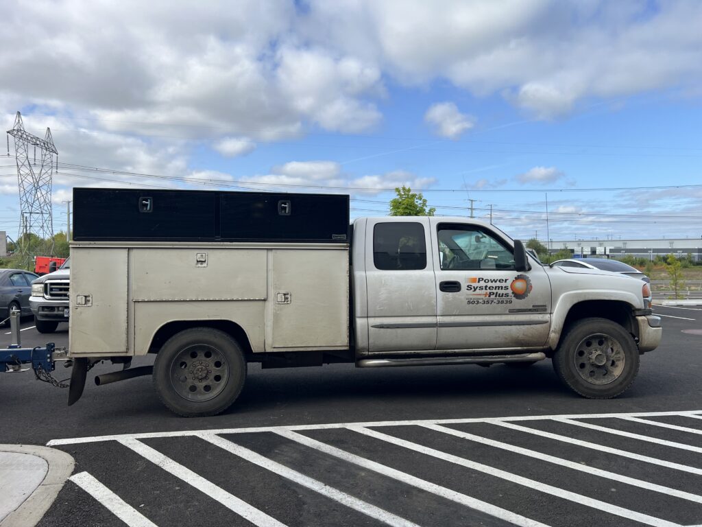 A Power Systems Plus GMC truck