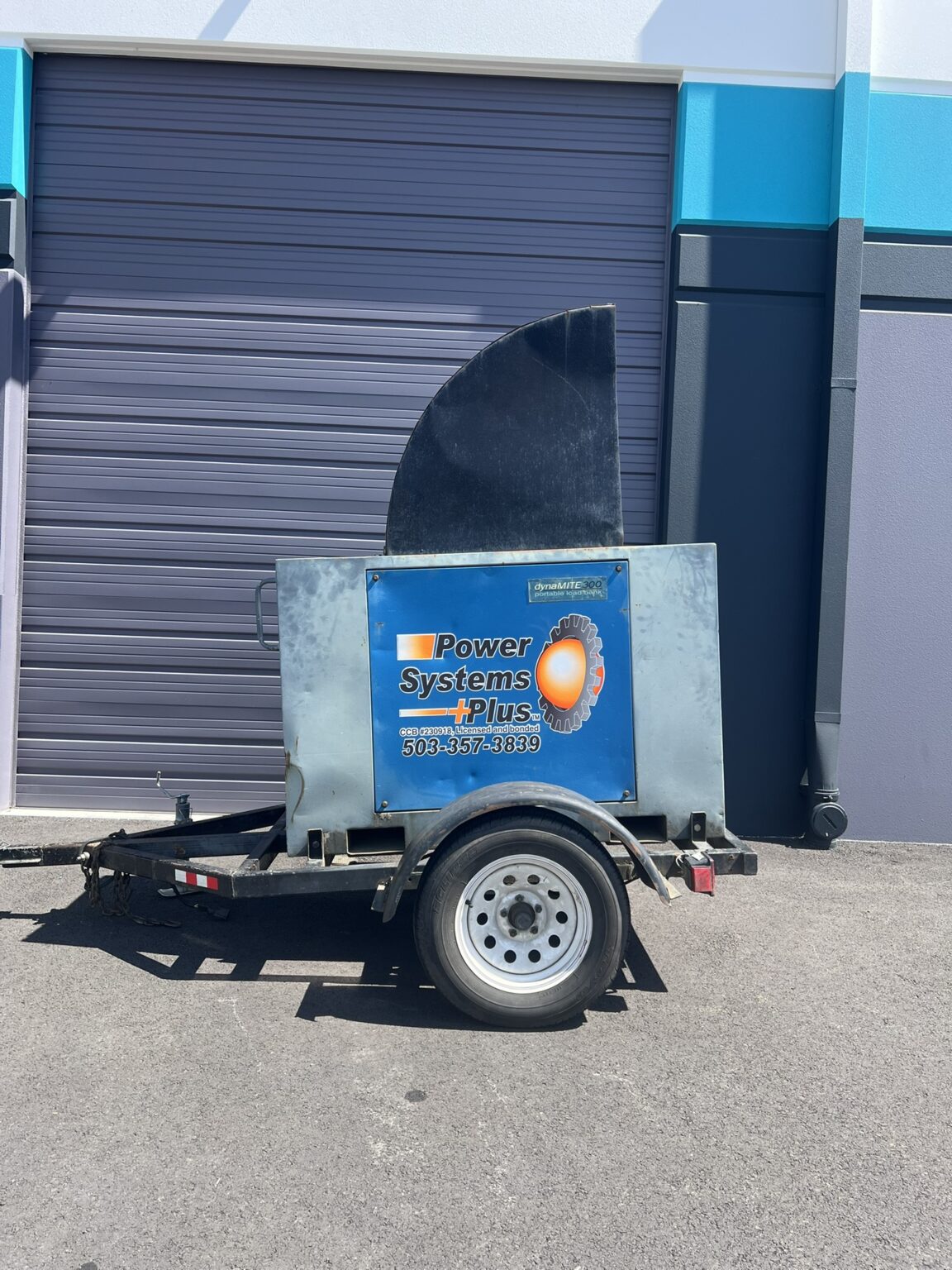 A towable load bank with a Power Systems Plus logo for generator service in Oregon